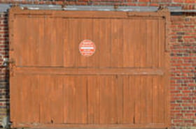 Porte de garage coulissante&nbsp;: comment la poser
