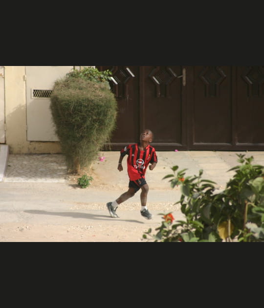 Enfant, foot et rue