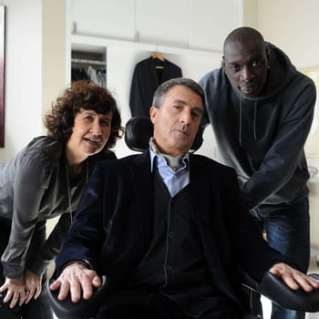 françois cluzet, entouré d'anne le ny et omar sy