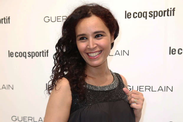 Aïda Touihri rigole après une remarque de Thomas Lequertier