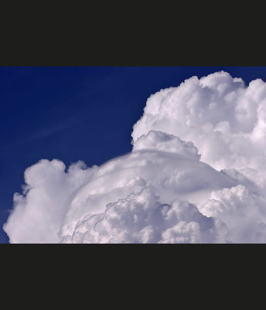 La t&ecirc;te dans un gros nuage