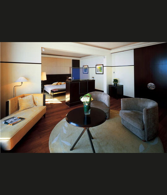 Chambre coloniale de la suite Penthouse