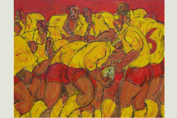 Les joueurs emmêlés en mêlée