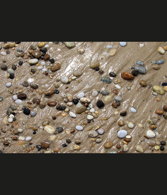 Sable envahi par les galets